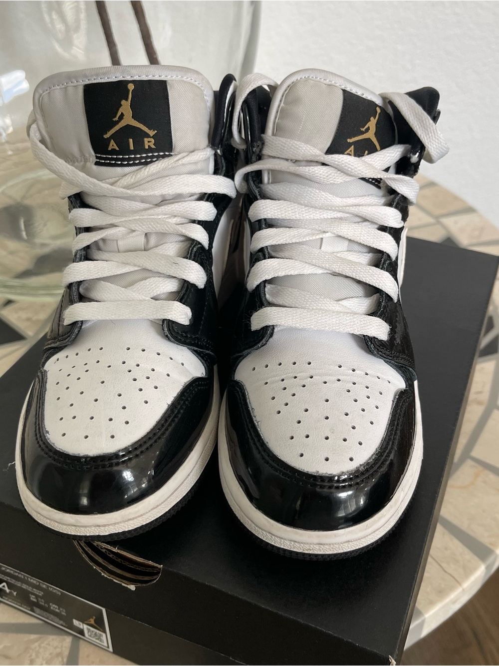 Jordan Kids Black and White High-Top Sneakers